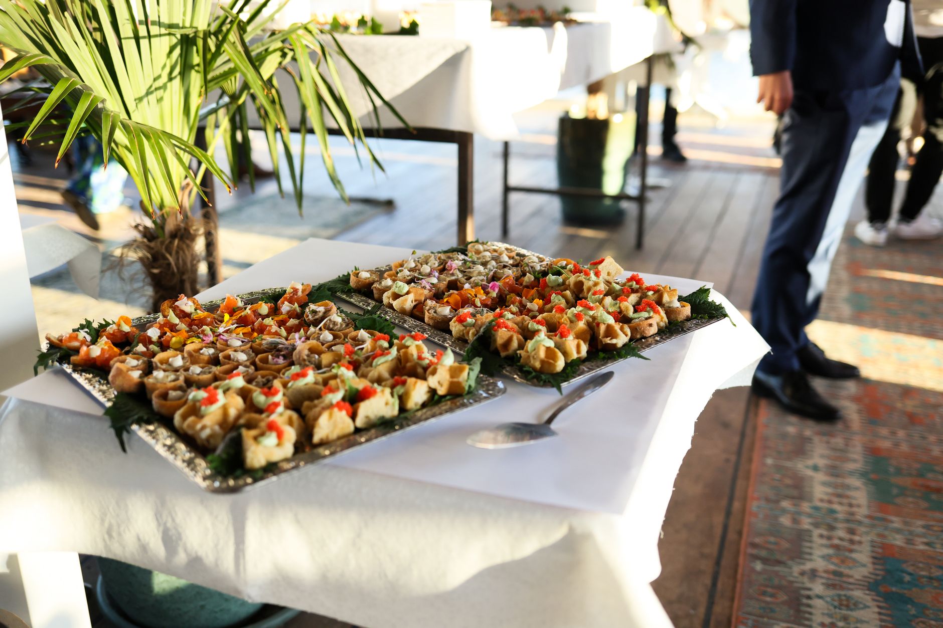 Canape trays on a styled outdoor table