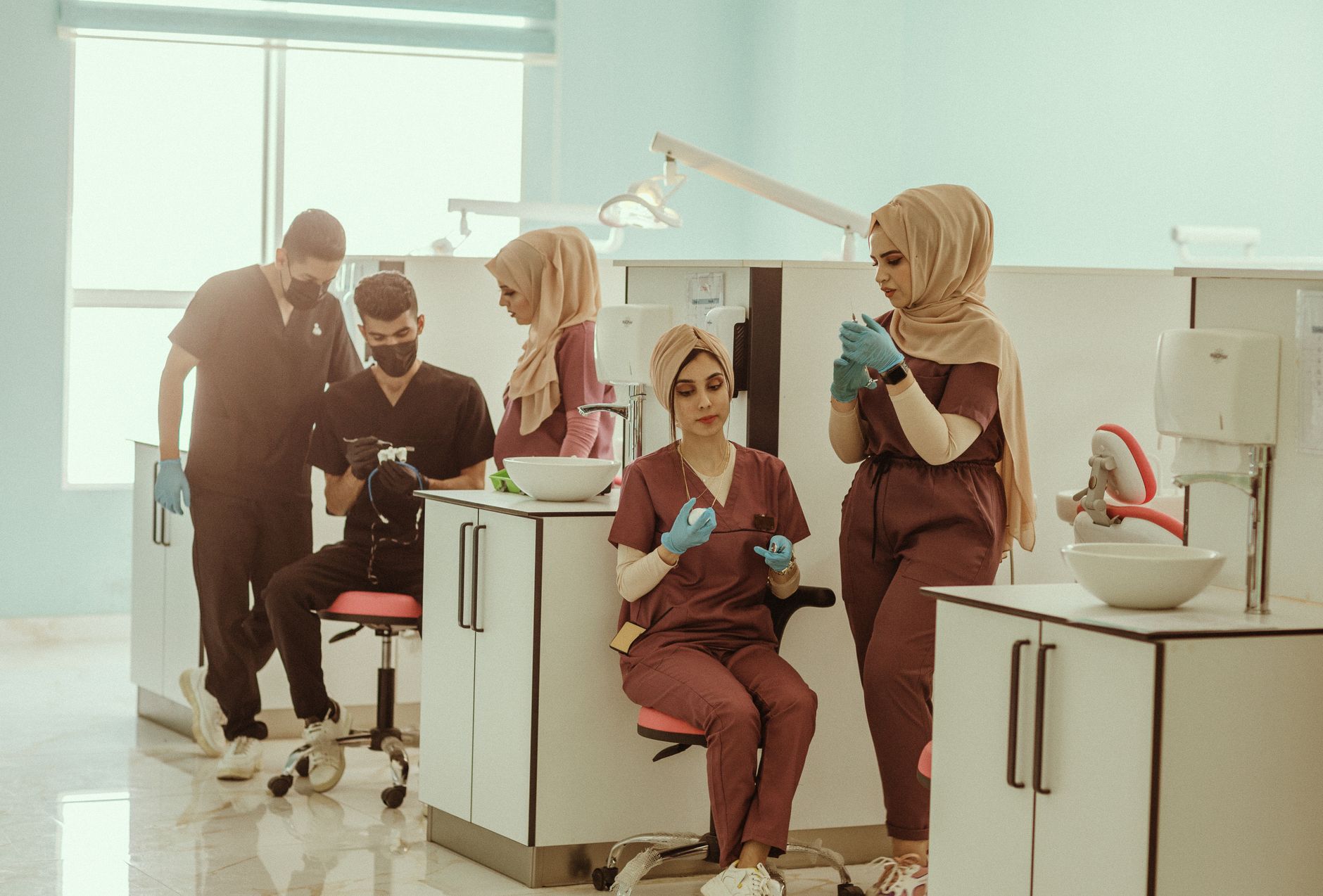 Dr. Sofia Aquino preparing instruments with the clinic team