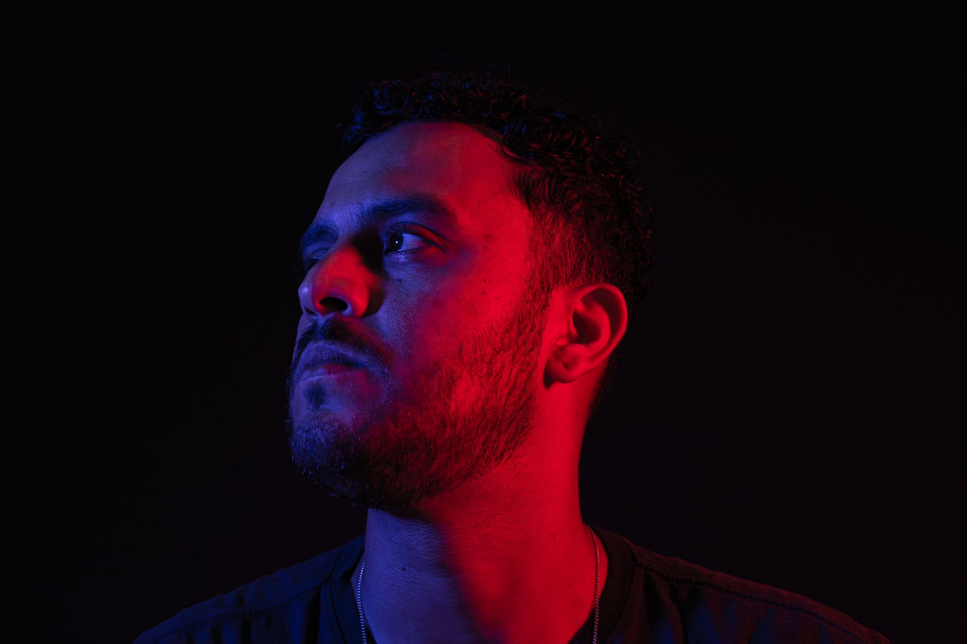 Portrait lit in red and blue