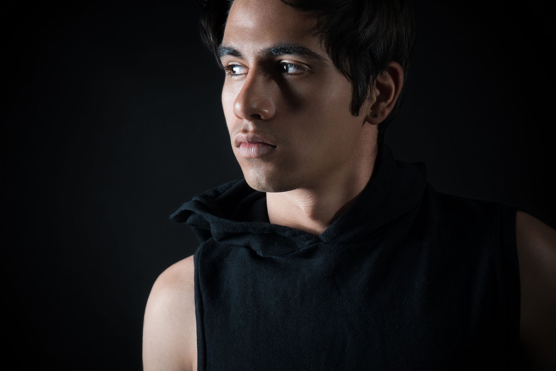Low key portrait of a young man